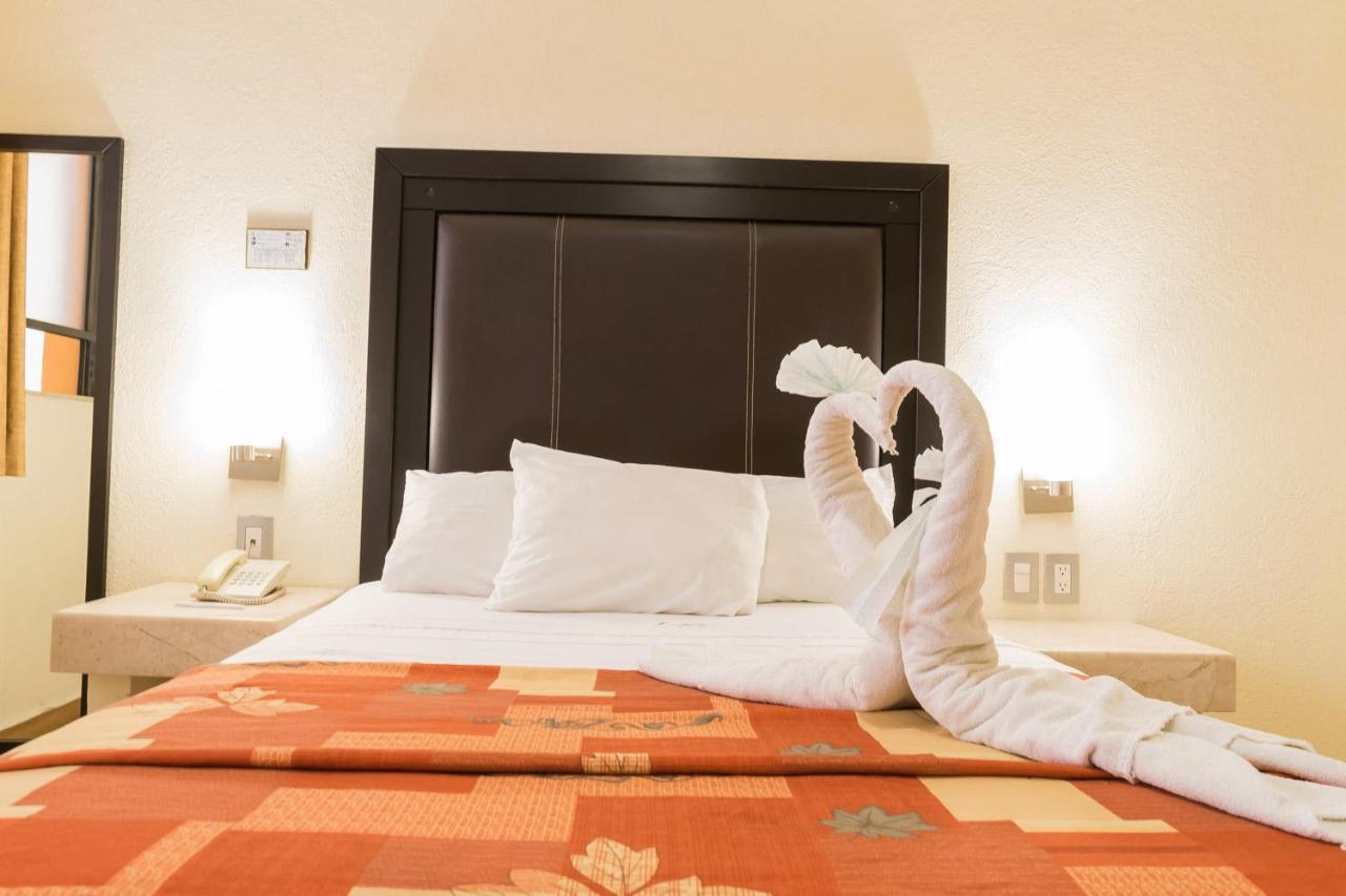 Hotel Posada Guadalupe ปวยบลา ภายนอก รูปภาพ