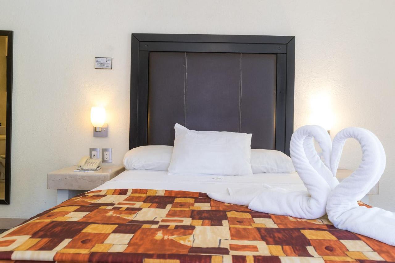 Hotel Posada Guadalupe ปวยบลา ภายนอก รูปภาพ