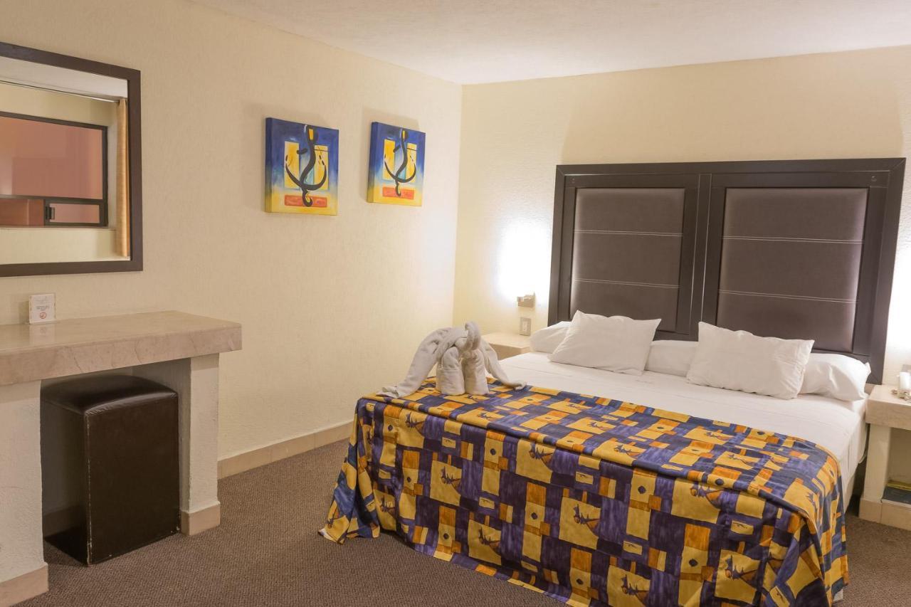 Hotel Posada Guadalupe ปวยบลา ภายนอก รูปภาพ