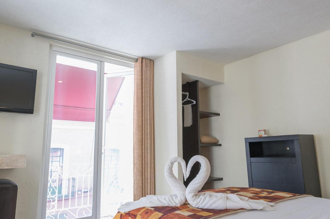 Hotel Posada Guadalupe ปวยบลา ภายนอก รูปภาพ