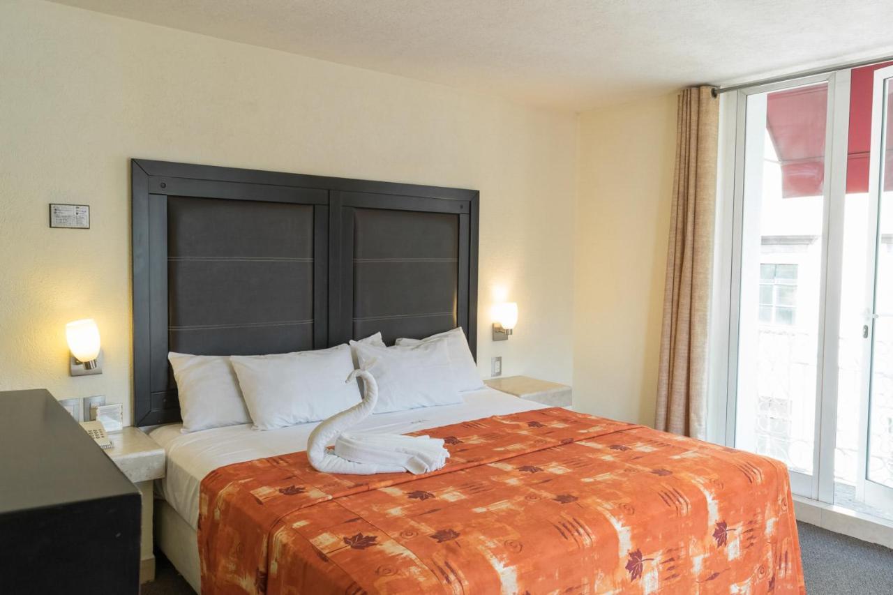 Hotel Posada Guadalupe ปวยบลา ภายนอก รูปภาพ