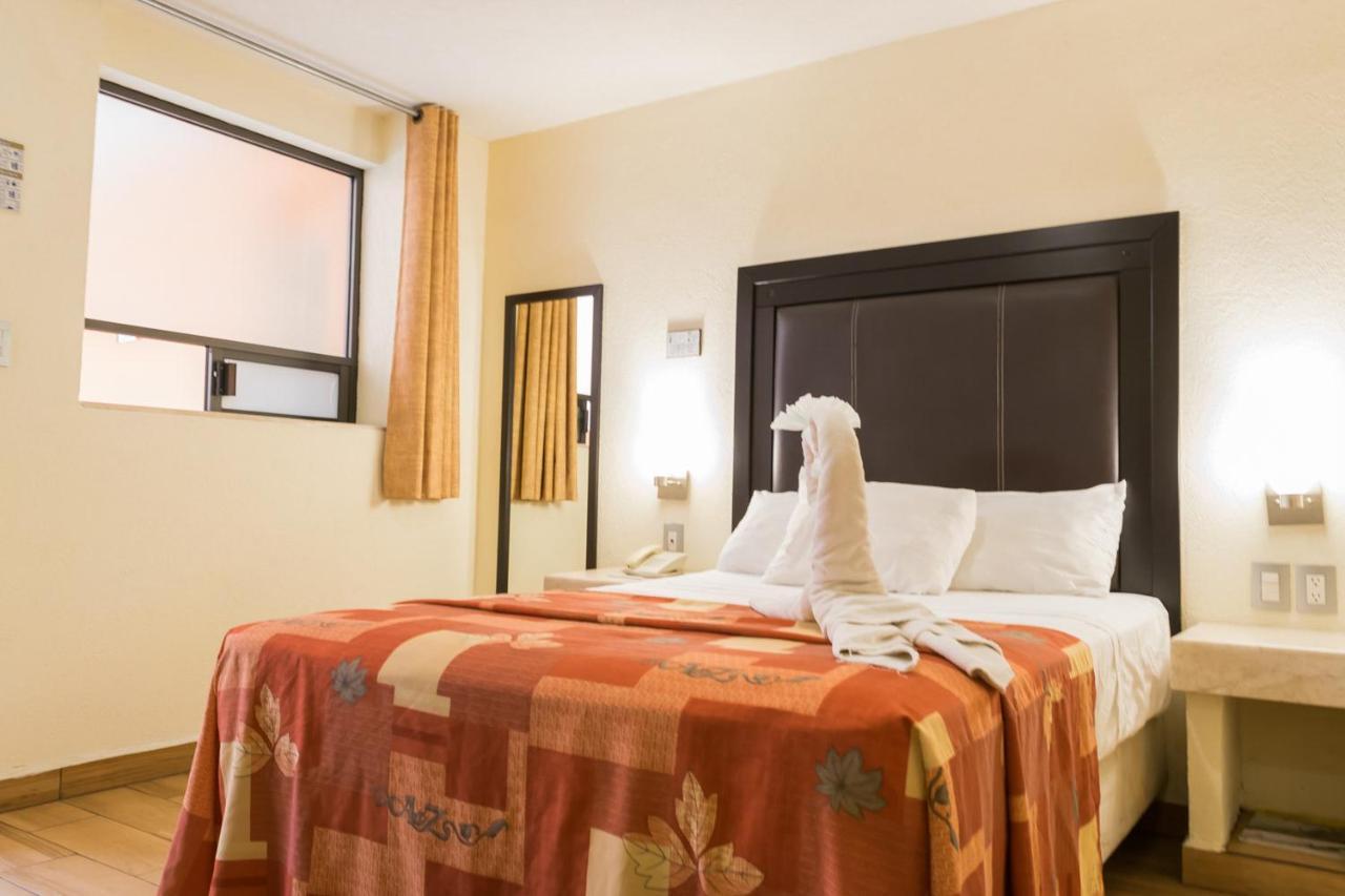 Hotel Posada Guadalupe ปวยบลา ภายนอก รูปภาพ
