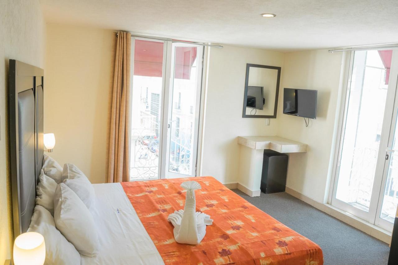 Hotel Posada Guadalupe ปวยบลา ภายนอก รูปภาพ