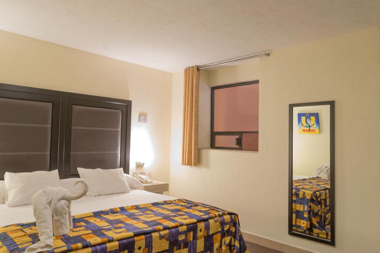Hotel Posada Guadalupe ปวยบลา ภายนอก รูปภาพ