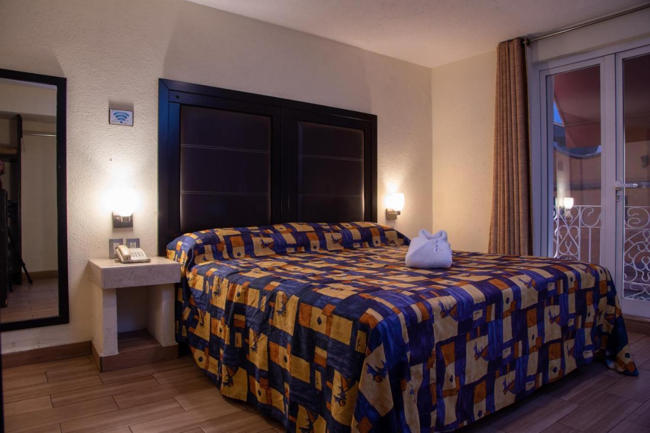 Hotel Posada Guadalupe ปวยบลา ภายนอก รูปภาพ