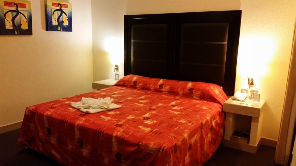 Hotel Posada Guadalupe ปวยบลา ภายนอก รูปภาพ