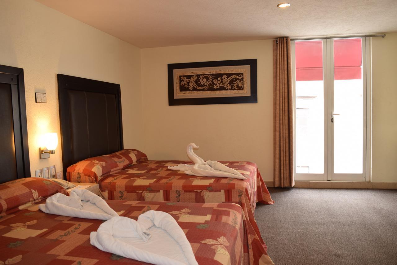 Hotel Posada Guadalupe ปวยบลา ภายนอก รูปภาพ