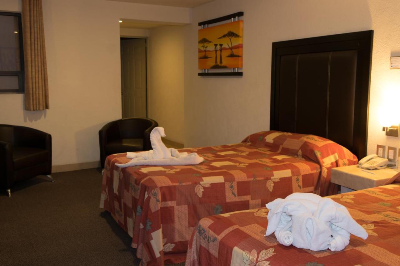 Hotel Posada Guadalupe ปวยบลา ภายนอก รูปภาพ